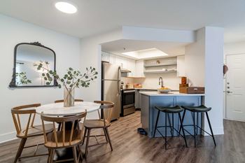 Expansive kitchens with breakfast bar in select homes